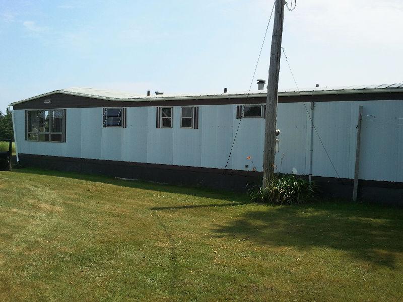 12x56 trailer used as cottage. Has a terrific waterview