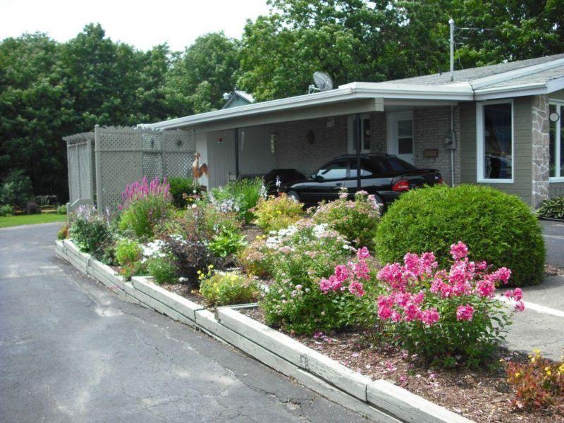 Maison avec grand terrain et garage atelier à Sts-Anges Beauce