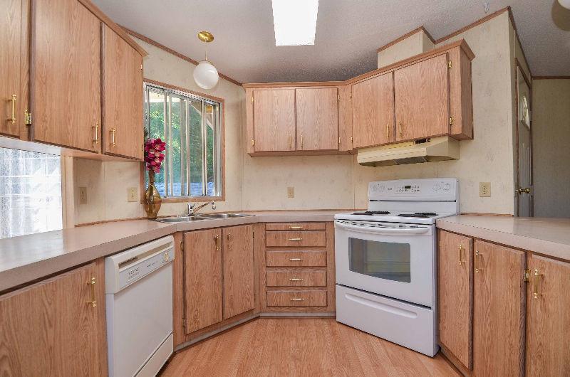 Charming well kept mobile home in quiet park ~ MLS 412602