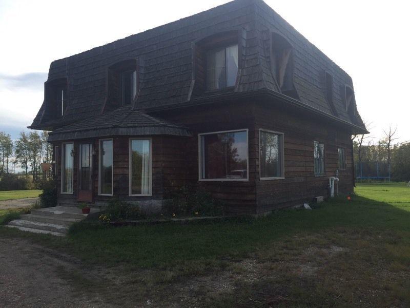 Acreage for sale between Grimshaw and Peace River