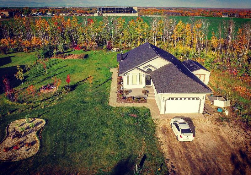 **PRICE REDUCTION** THIS BEAUTIFUL ACREAGE AWAITS!