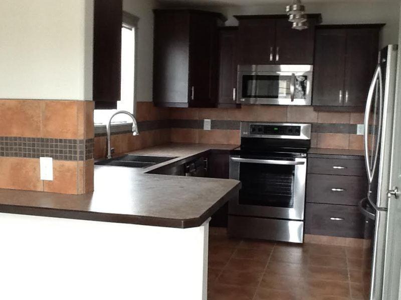 Call us now! Modern and spacious duplex in Normandeau!