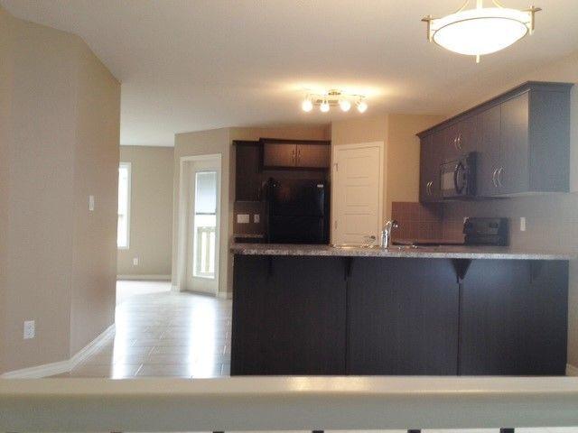 Newly listed modern main floor in Ryders Ridge! Only $1195/mth