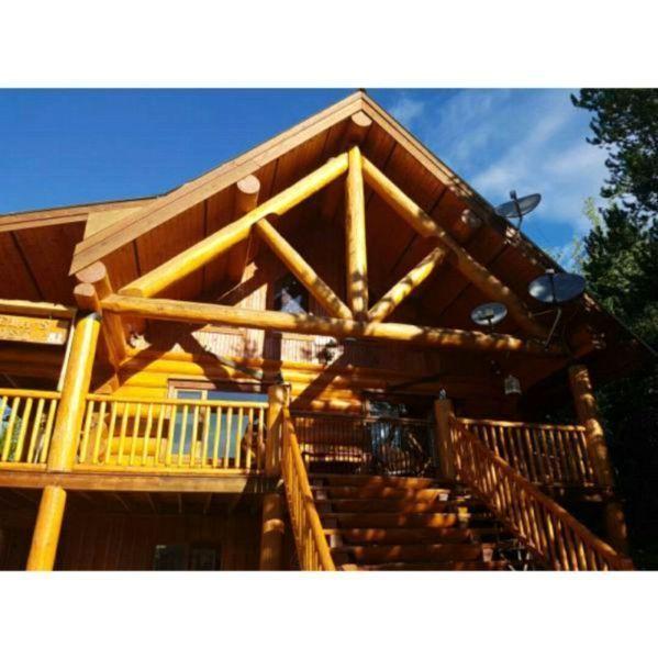 Log home for sale at Mile high estate (face lake, Logan lake BC)