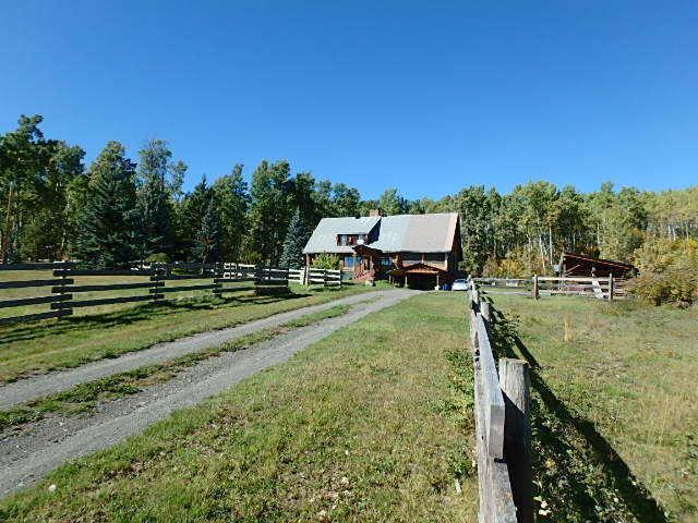 SPECTACULAR 3 STORY LOG HOME ON 6.25 ACRES FOR SALE