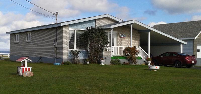 Maison au bord de la mer à Grande-Anse, NB