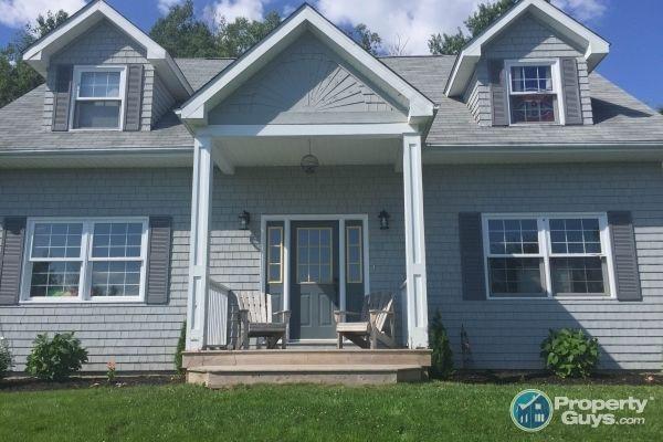 3 bedroom, 2.5 bath Cape Cod with an attached double garage