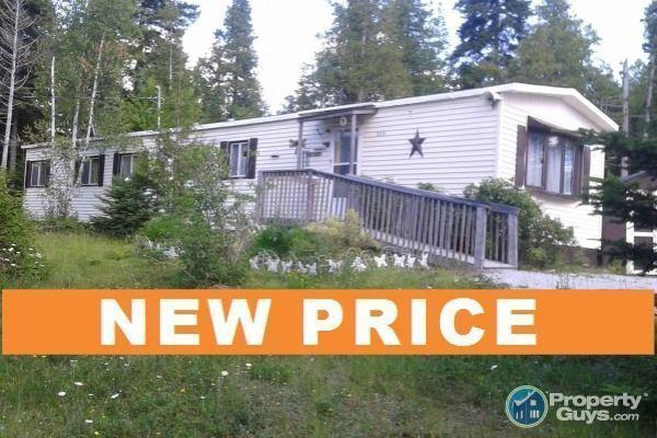 NEW PRICE! $54,900 for almost 2 Acres with mobile home!