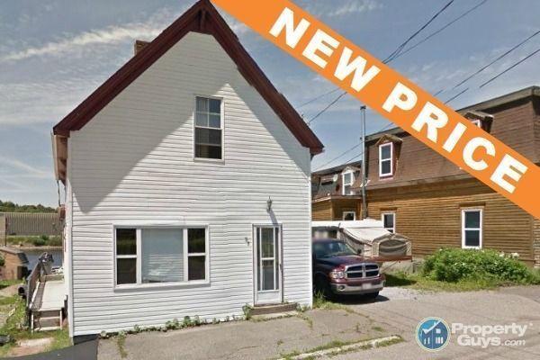 NEW PRICE! Lots of potential, solid structure & good sized lot