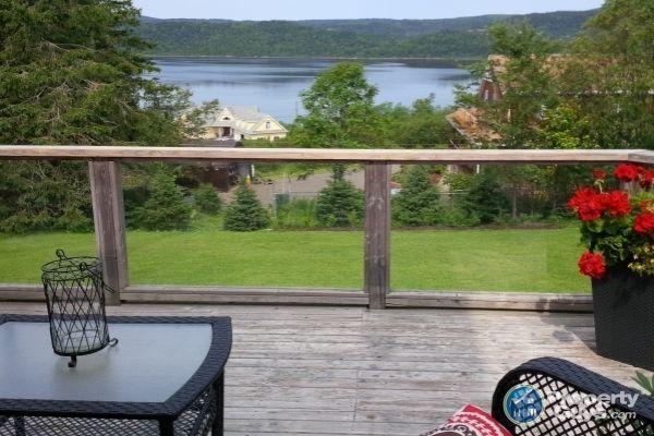 Overlooking the Kennebecasis River, over 3600 sqft of space!